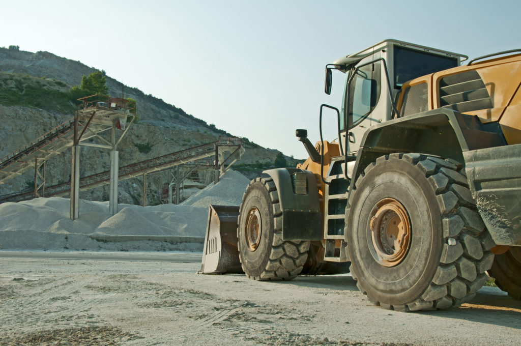 a bulldozer truck on the construction site