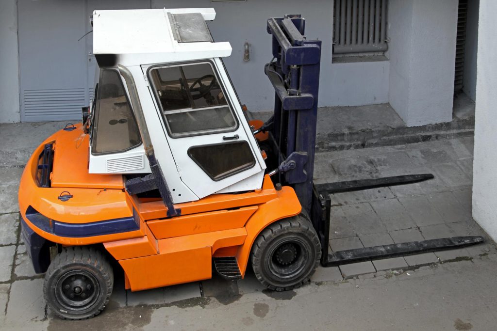 an orange skid steer