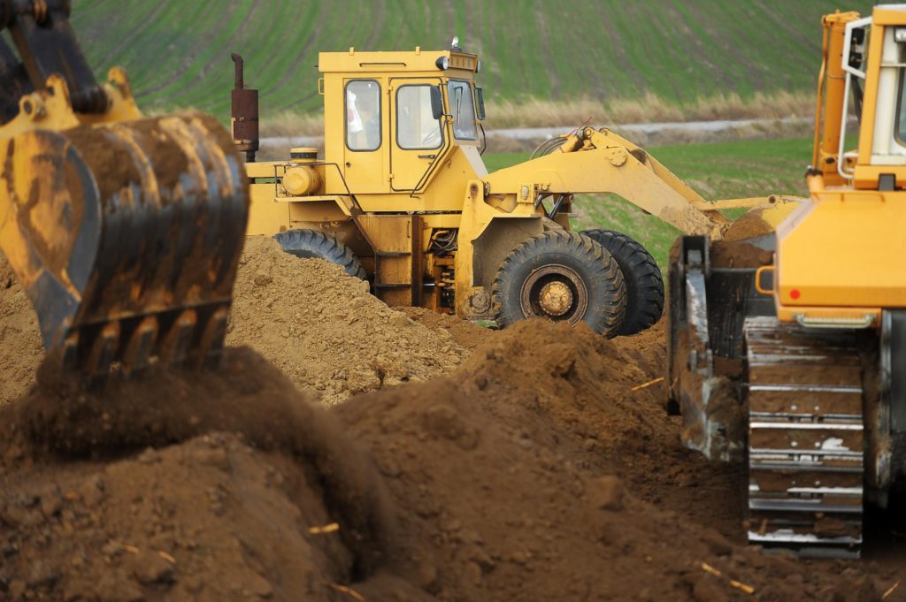 a backhoe doing excavation